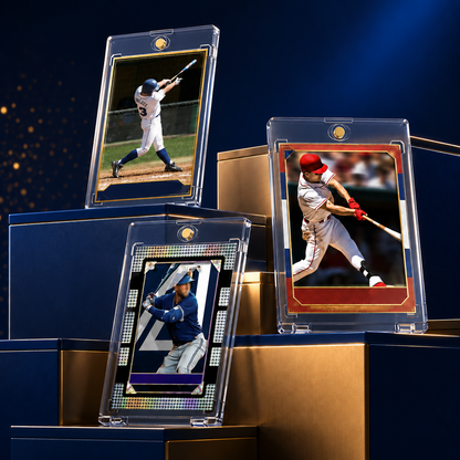 Three clear acrylic sports card holders displaying baseball player photos, arranged on dark blue and gold display blocks against a dark blue background.
