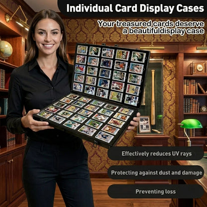 Woman holding a display case with trading cards in a room with bookshelves and a lamp.